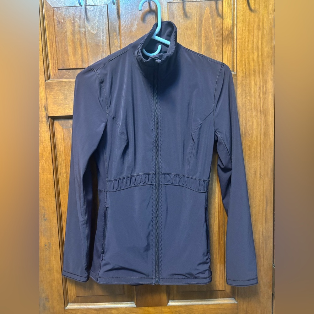 Lululemon jacket.  Fitted Plum color.  Gathers on back.